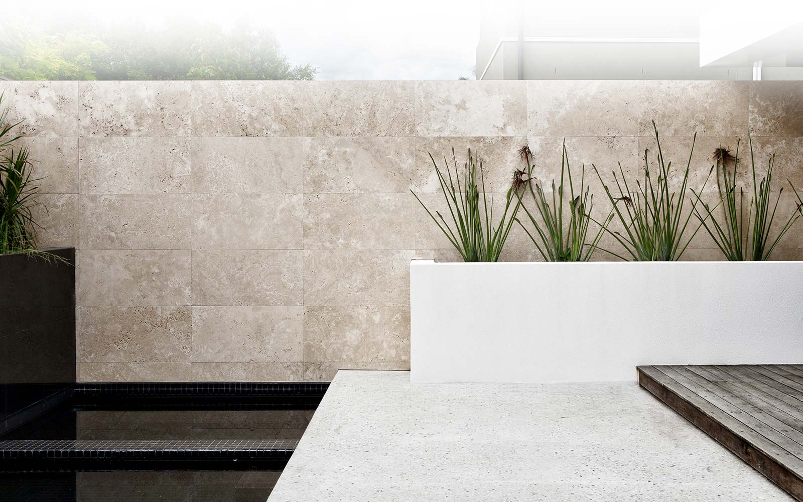 Travertine Tiles on a wall Honed and Filled 1